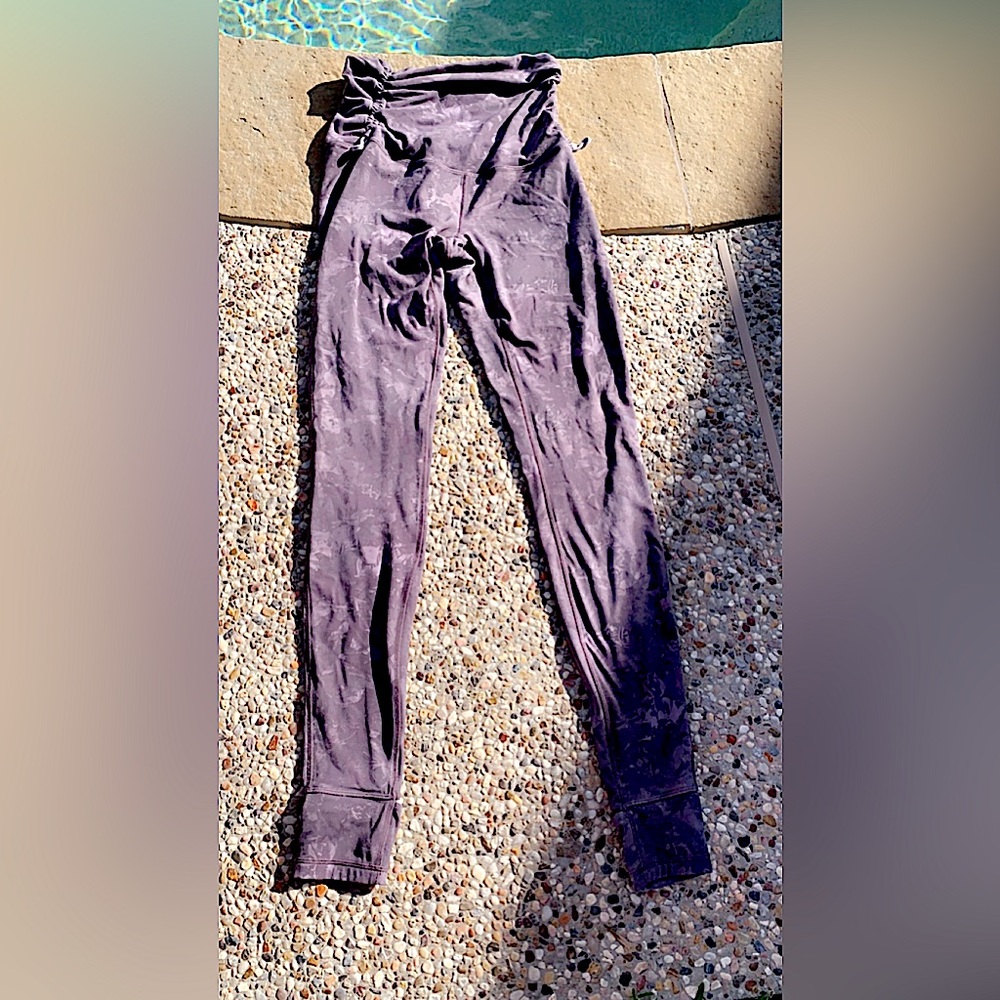 Lululemon leggings. The size is a 8 and the color is purple.